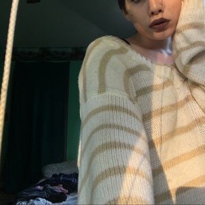 Dingy white& brown striped sweater. It’s a v neck